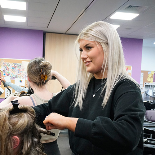 student in salon