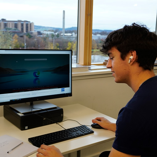 student on computer