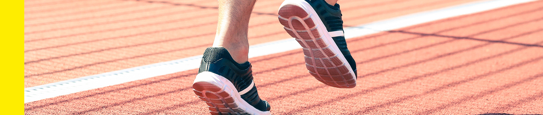 Student running on a track