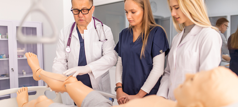 Male doctor training students