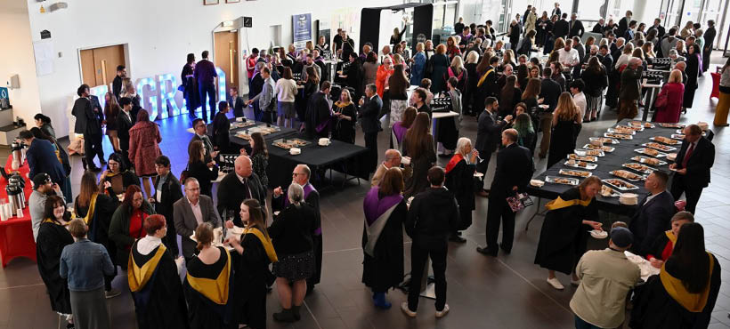 Large group shot of Graduation celebration event at in UHI Inverness atrium Large group shot of Graduation celebration event at in UHI Inverness atrium