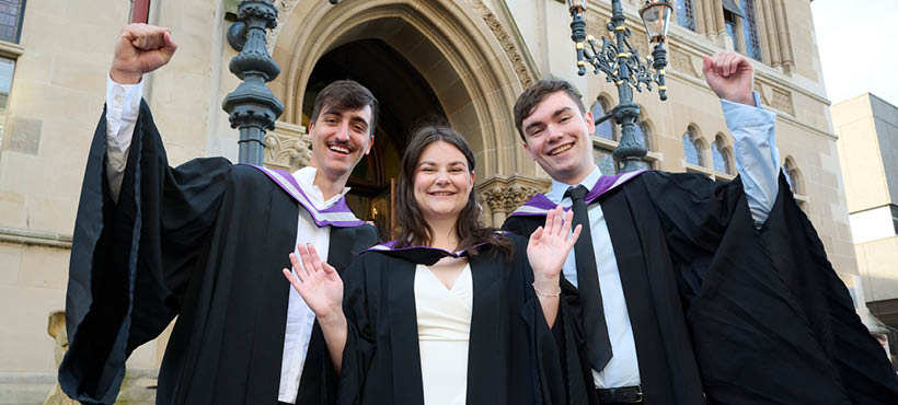 UHI Inverness graduans celebrating and smiling to the camera UHI Inverness graduans celebrating and smiling to the camera