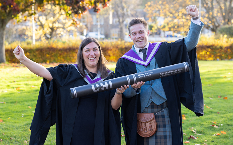 UHI Inverness graduates celebrating. UHI Inverness graduates celebrating.