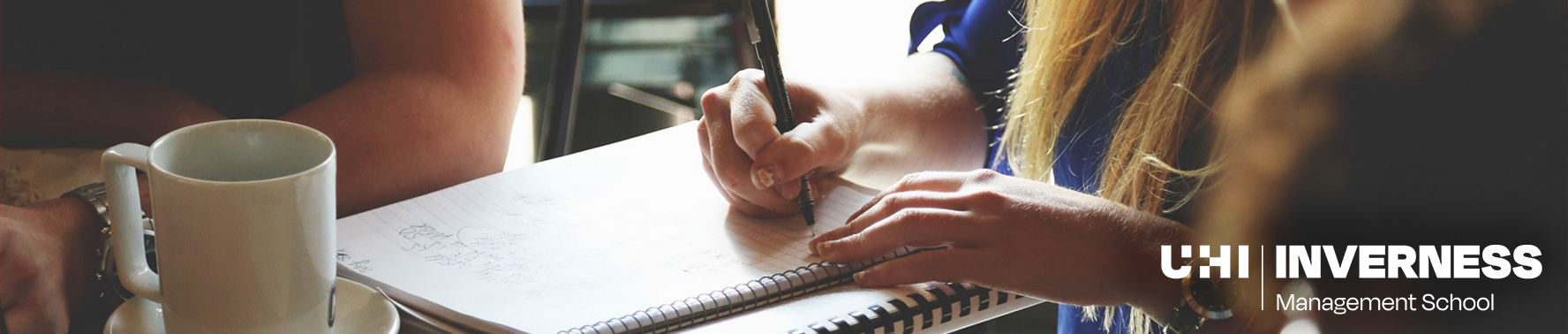 Girl writing in a notebook