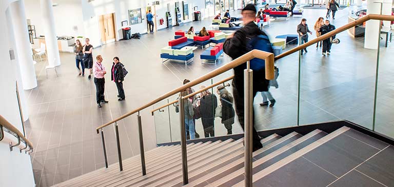 Students in foyer of college