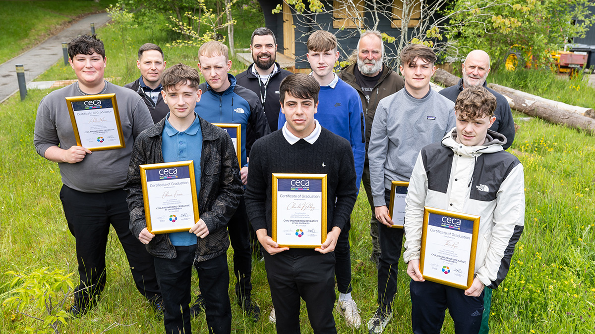 Seven students with their lecturers