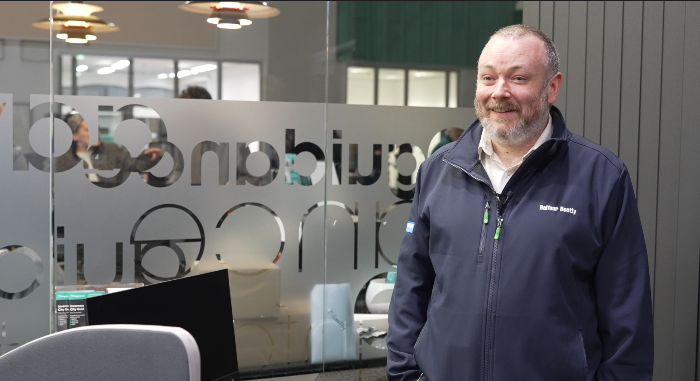 Duncan Gardner standing in a college campus Duncan Gardner standing in a college campus