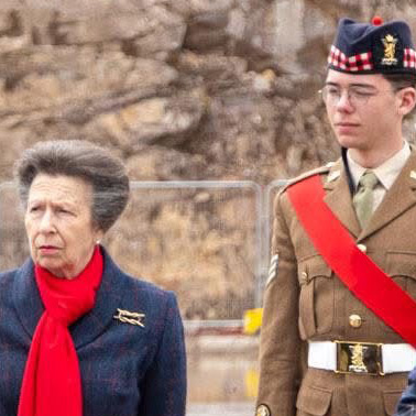 Student Keiran in his cadet uniform standing with Princess Anne Student Keiran in his cadet uniform standing with Princess Anne