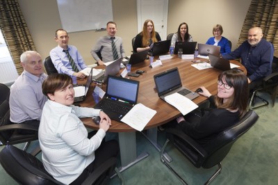 Computing lecturer Gordon MacPherson delivers IT training to staff from Tulloch Homes.