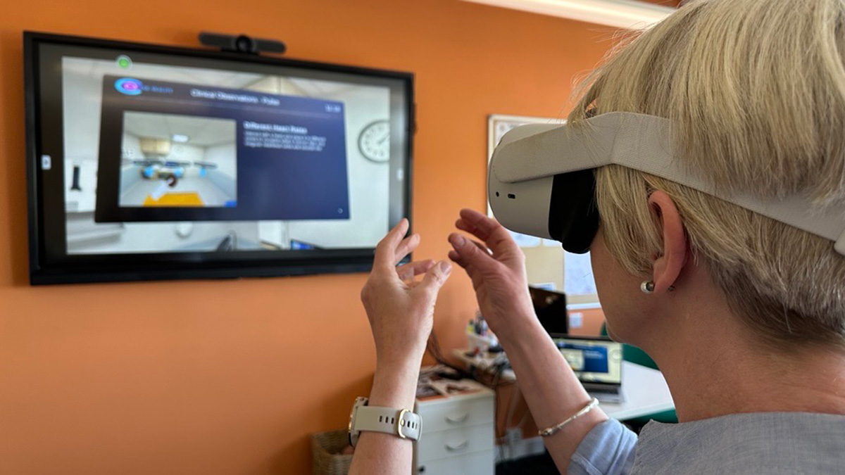 A woman with fair hair wearing a VR headset