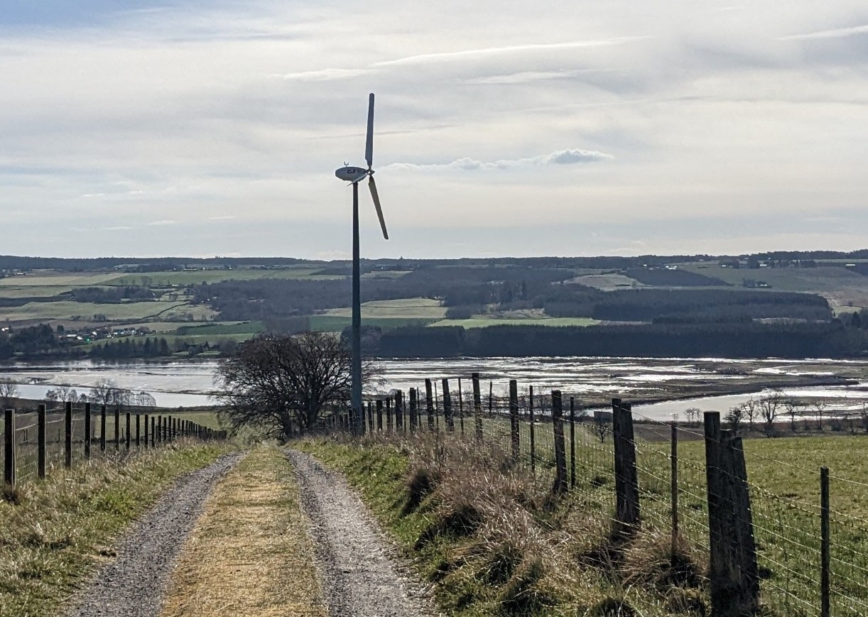 Windturbin with the water in the backgrund