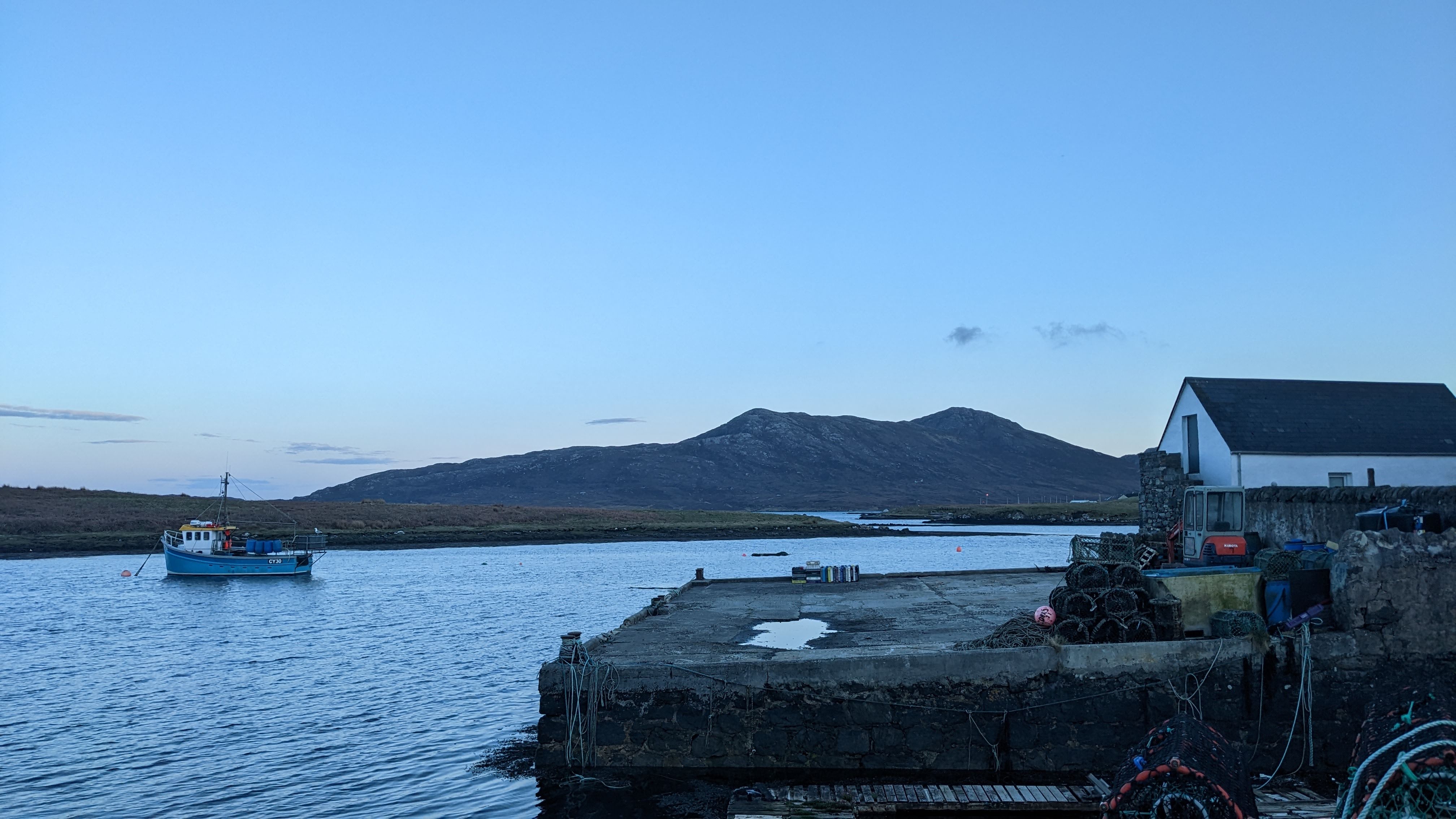Fishing boat next to the harbour