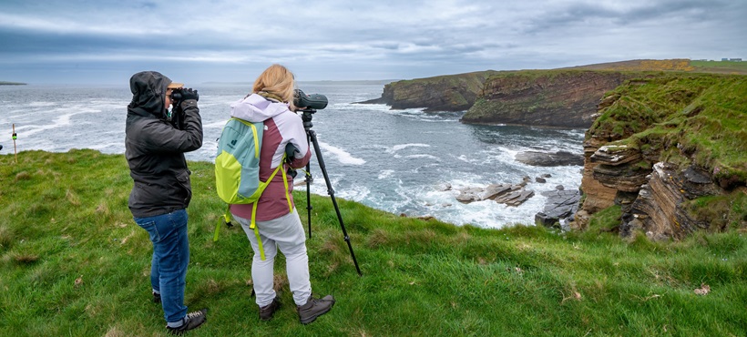 Photographer on a cliffside