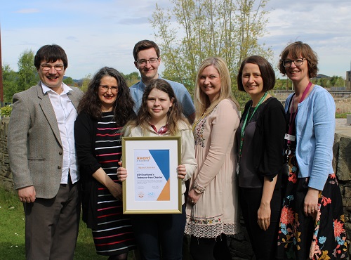 Award presentation to staff and students.