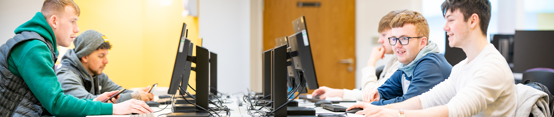 group of students on computers in Learning Resource Centre