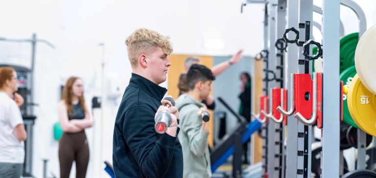 students in fitness suite students in fitness suite