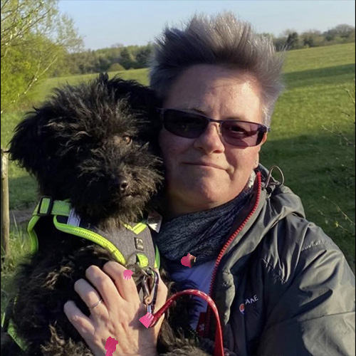 woman and dog facing camera