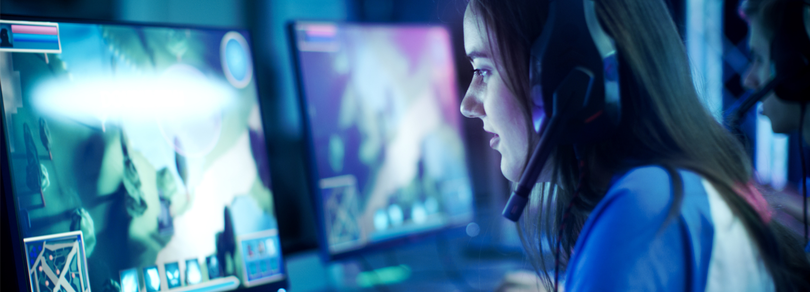 Female looking at screen working on computer game graphics